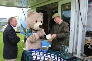 Baxterbear Rides Off on Poppy Bike