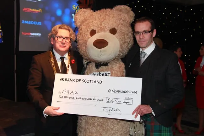 An amazing £4500 was raised for CHAS. (Left: Jimmy Martin SPAA President)